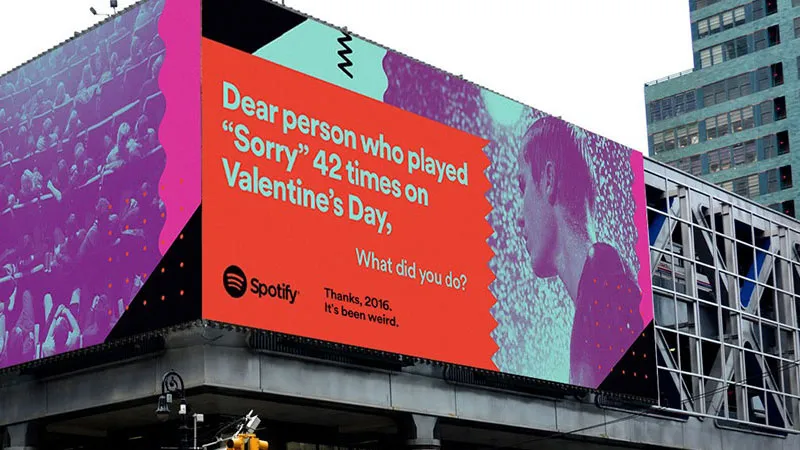 Spotify billboard on a building corner: “Dear person who played ‘Sorry’ 42 times on Valentine’s Day, What did you do?”, signed “Thanks, 2016. It’s been weird.”