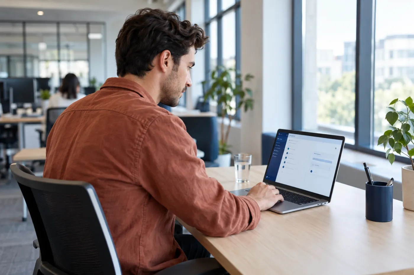 Illustrative scene: a person working in a software workspace
